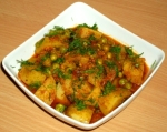 Curry de cartofi si mazare in sos de rosii